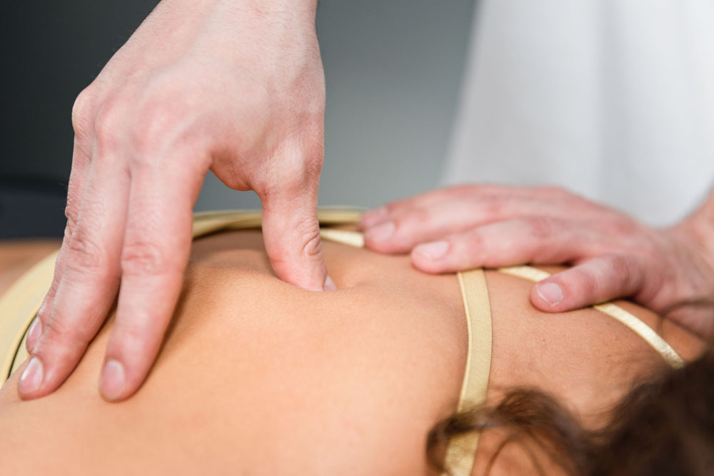 Woman getting massage therapy with Summerlin Chiropractor